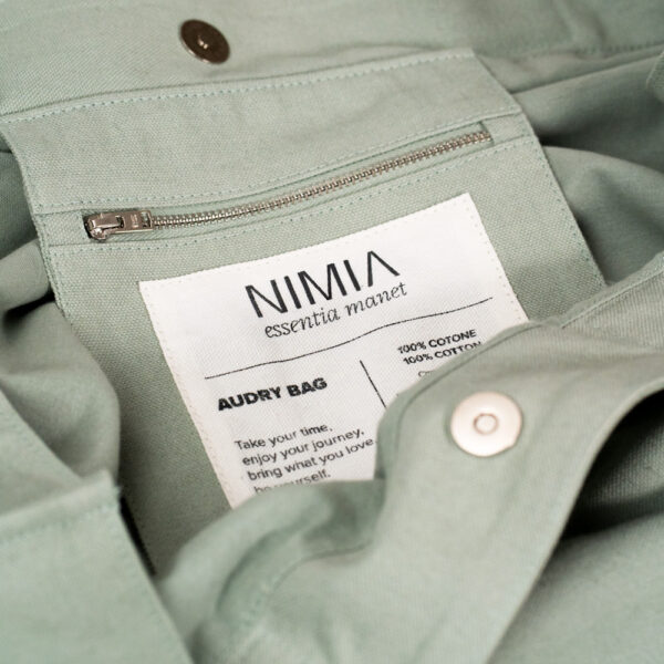 Wide bag made of green cotton canva